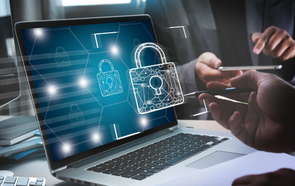 Photo of a laptop computer. Displayed over the top is a visual of a line drawing of a padlock